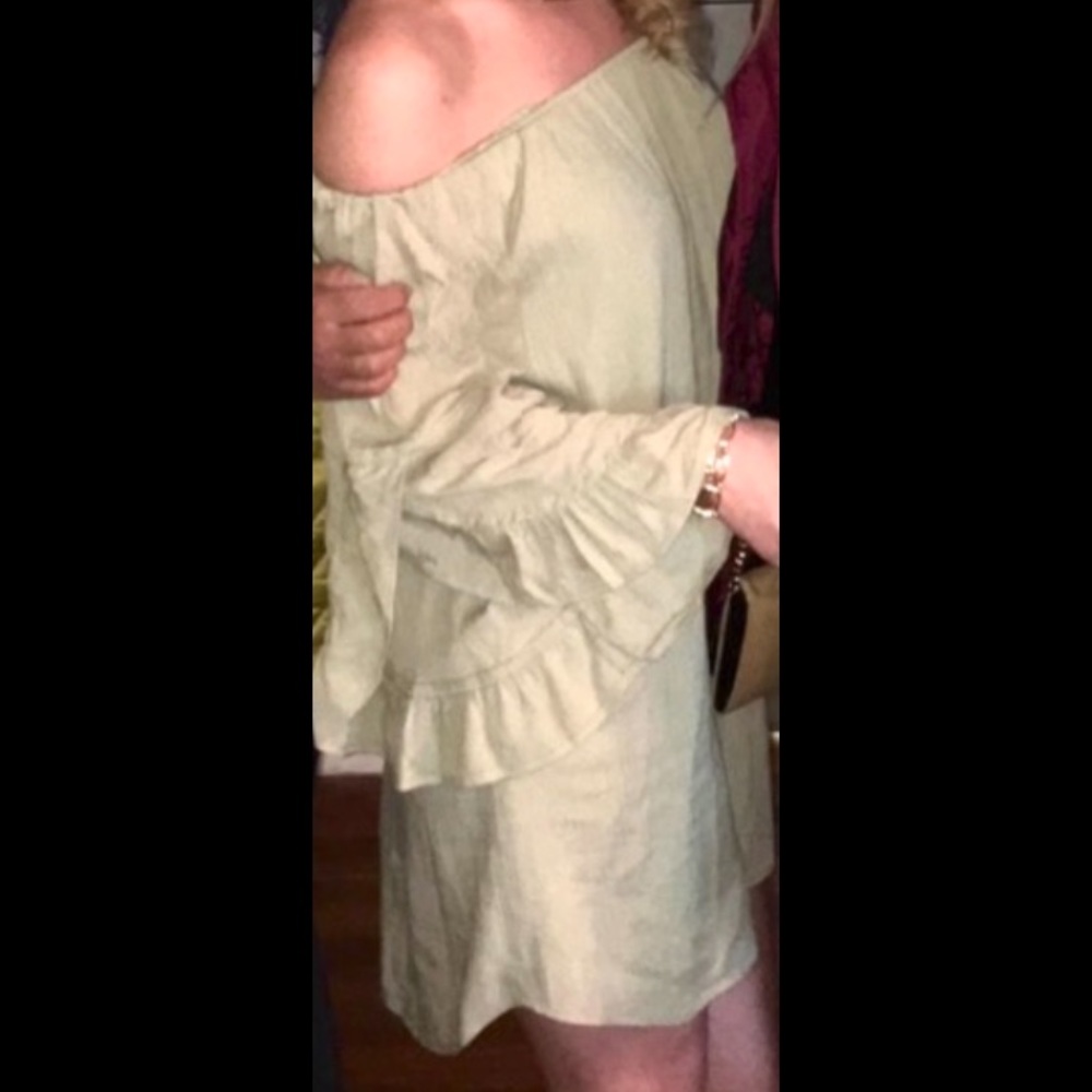 Green off the shoulder mid thigh length dress. Medium. Worn once. 3/4 sleeve